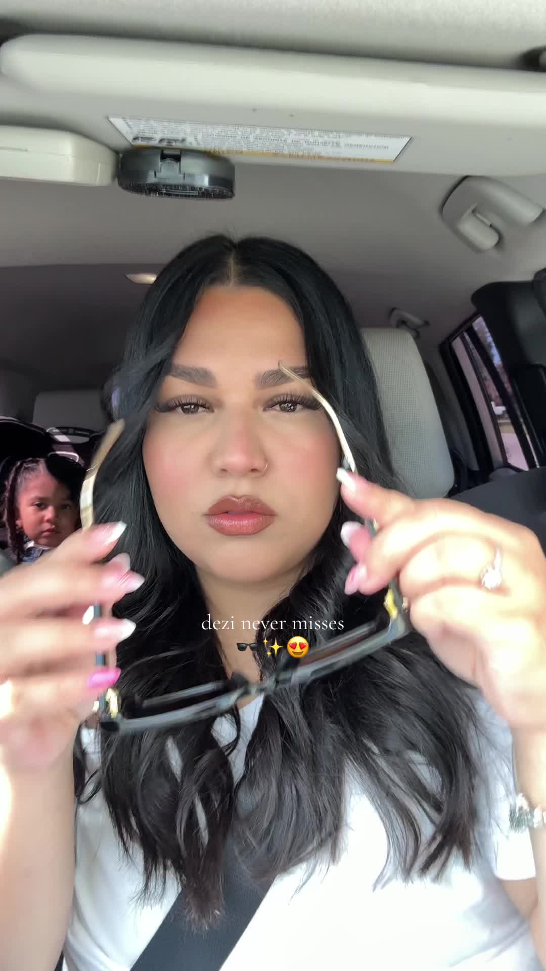 TikTok post by @valerieesernaa for DEZI. Caption reads: @DEZI EYEWEAR.