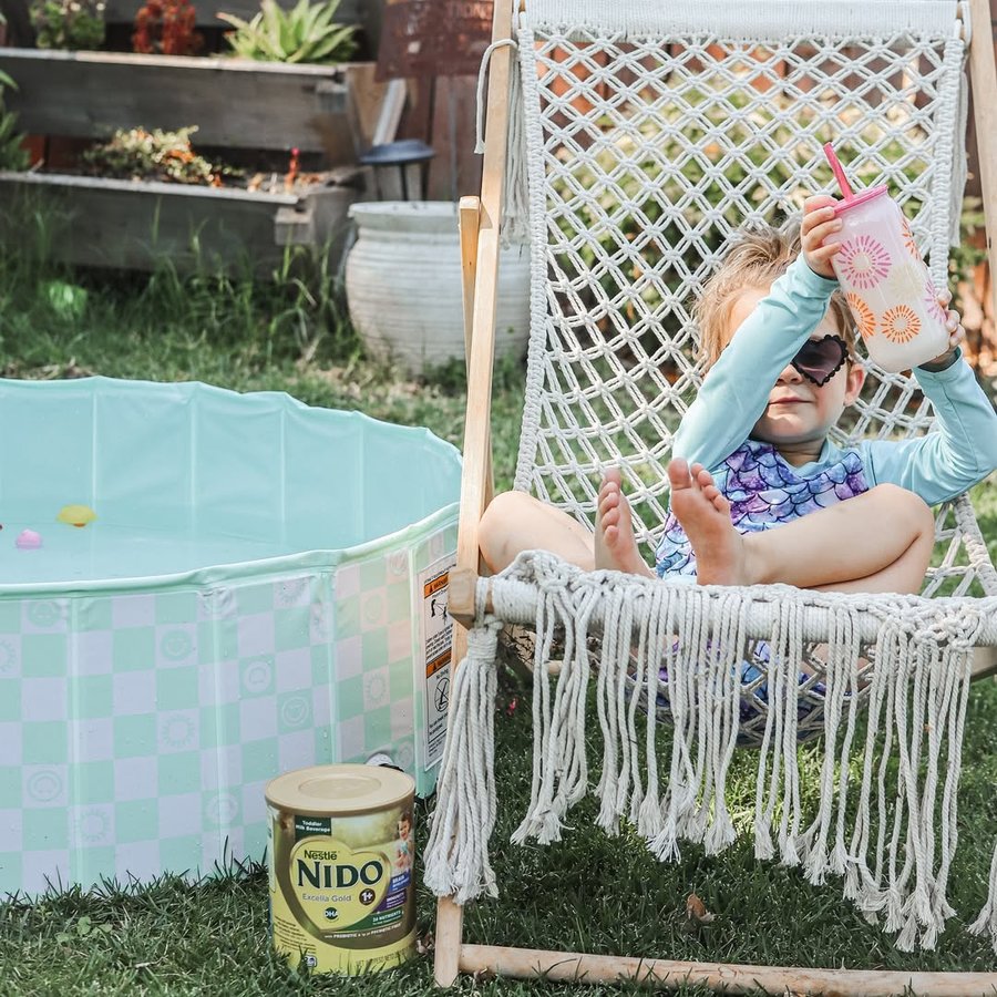 Instagram post by @haleymartinoxo for Soapbox Influence. Caption reads: Summer days with @nestlenidous ☀️ #ad My girl is....