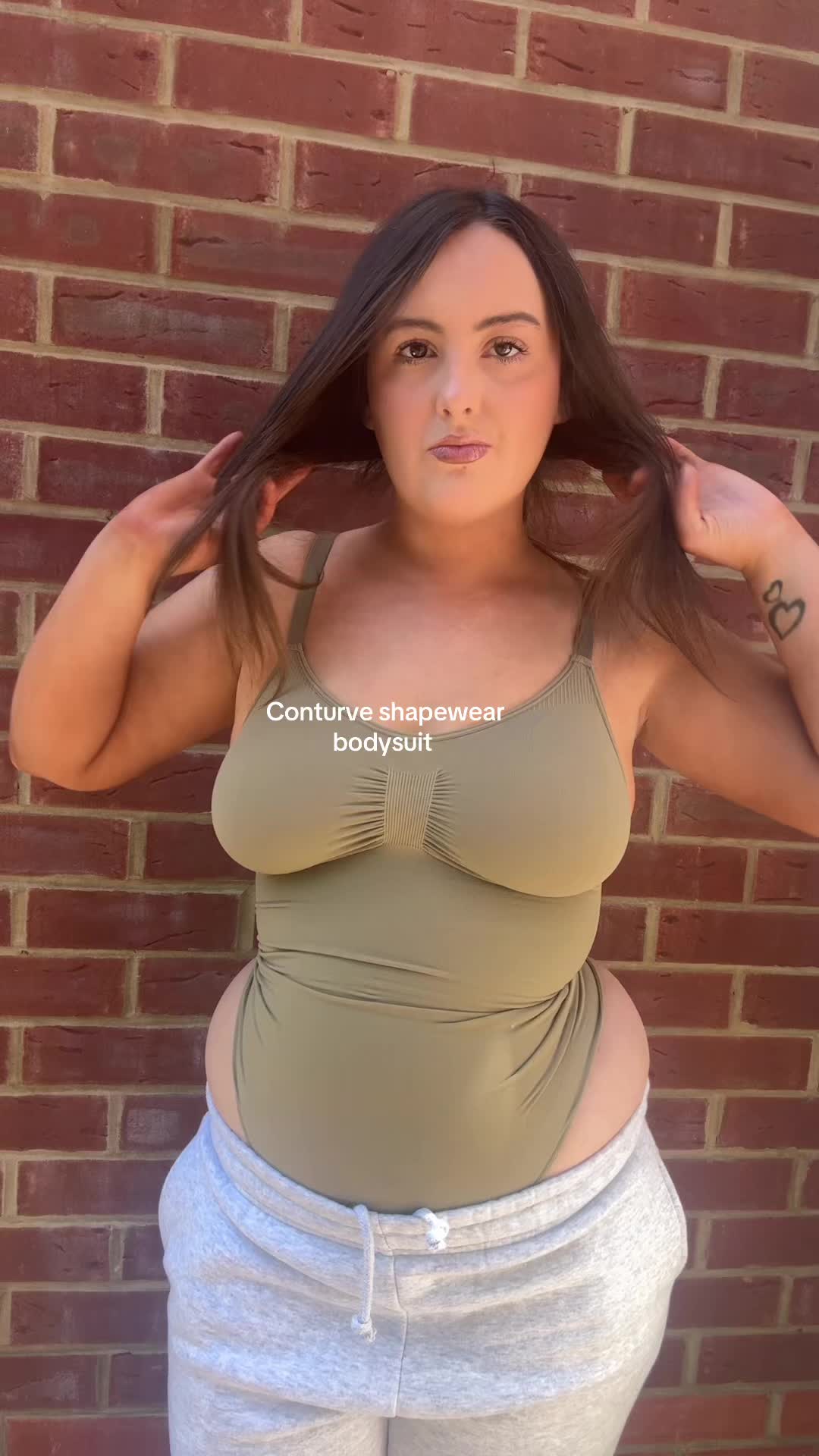 TikTok post by @beckywatts559 for Conturve. Caption reads: Conturve shapewear bodysuit 🤯 #bodysuit [...].