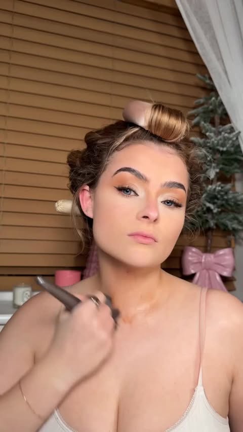 Instagram post by @byeleanorwood for Glossier. Caption reads: Save for your NYE inspo ✨✨ who’s ready to say....