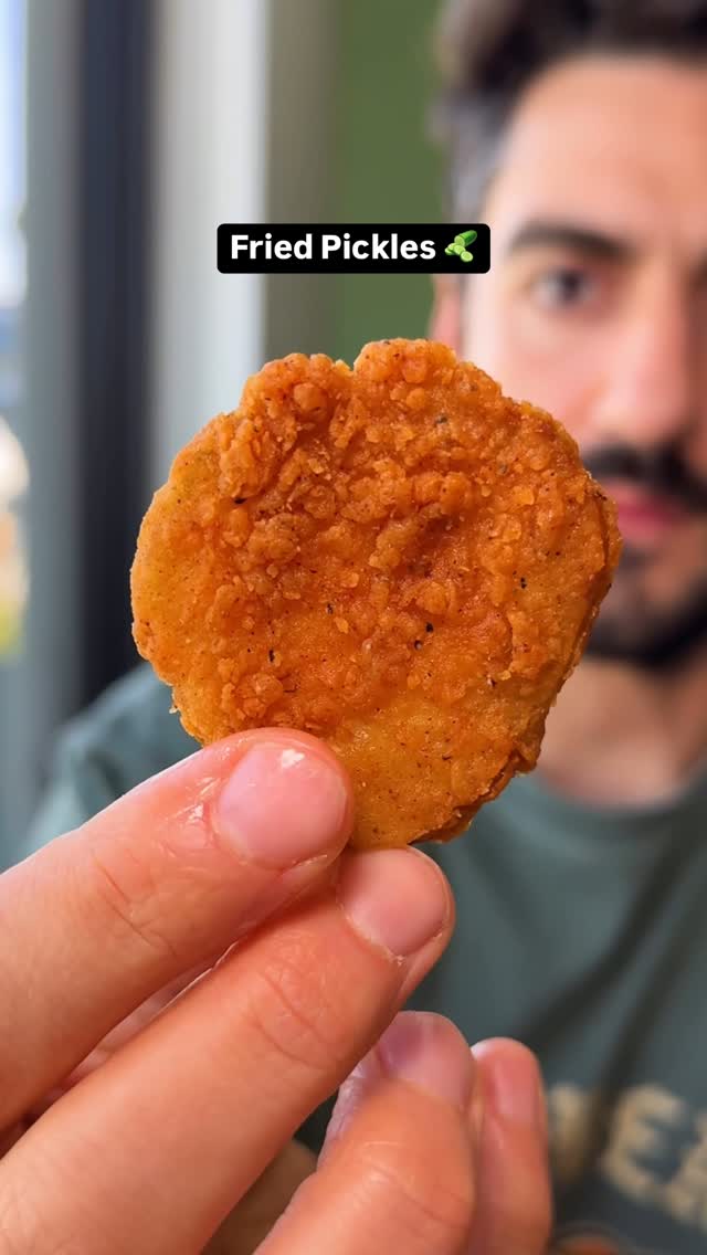 Instagram post by @foodbeast for Shake Shack. Caption reads: @shakeshack just unveiled a new Fried Pickle side....