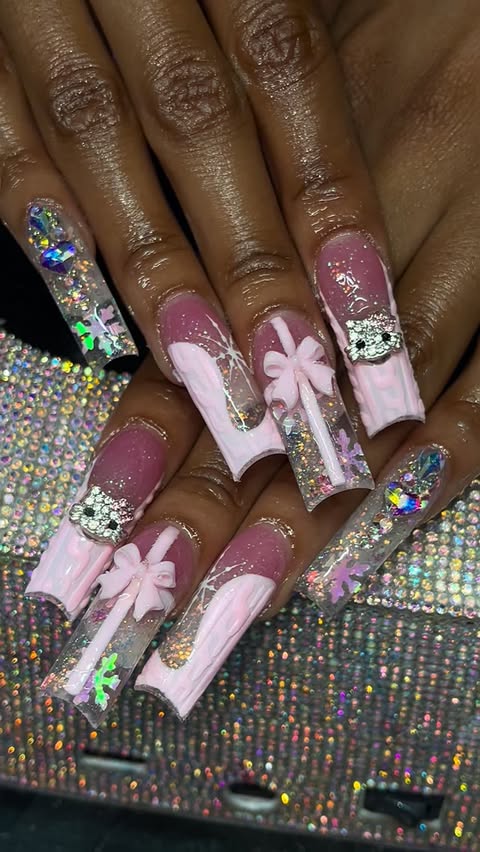 Instagram post by @rackznails for Madam Glam. Caption reads: [...] #pinkchristmasnails #naturalnailslong....