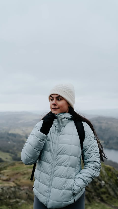 Instagram post by @travelthelakes for Regatta. Caption reads: [...] head. Getting outside anyway ❄️ ☔️....