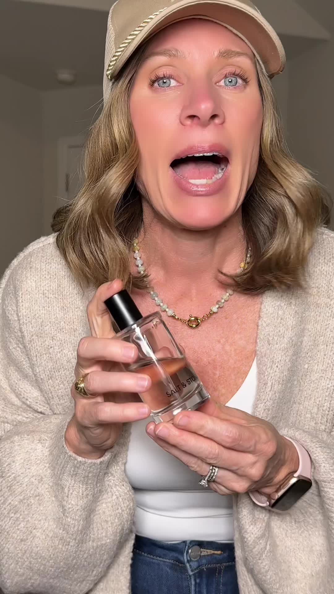 TikTok post by @the_edmonsons for SALT & STONE. Caption reads: @SALT & STONE #perfume #perfumetiktok [...].