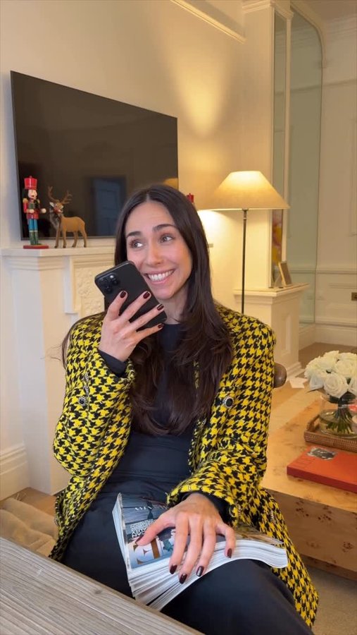 Instagram post by @ellieevelynsmith for WhatsApp. Caption reads: I guess the news is out 👀 Our group chat is....