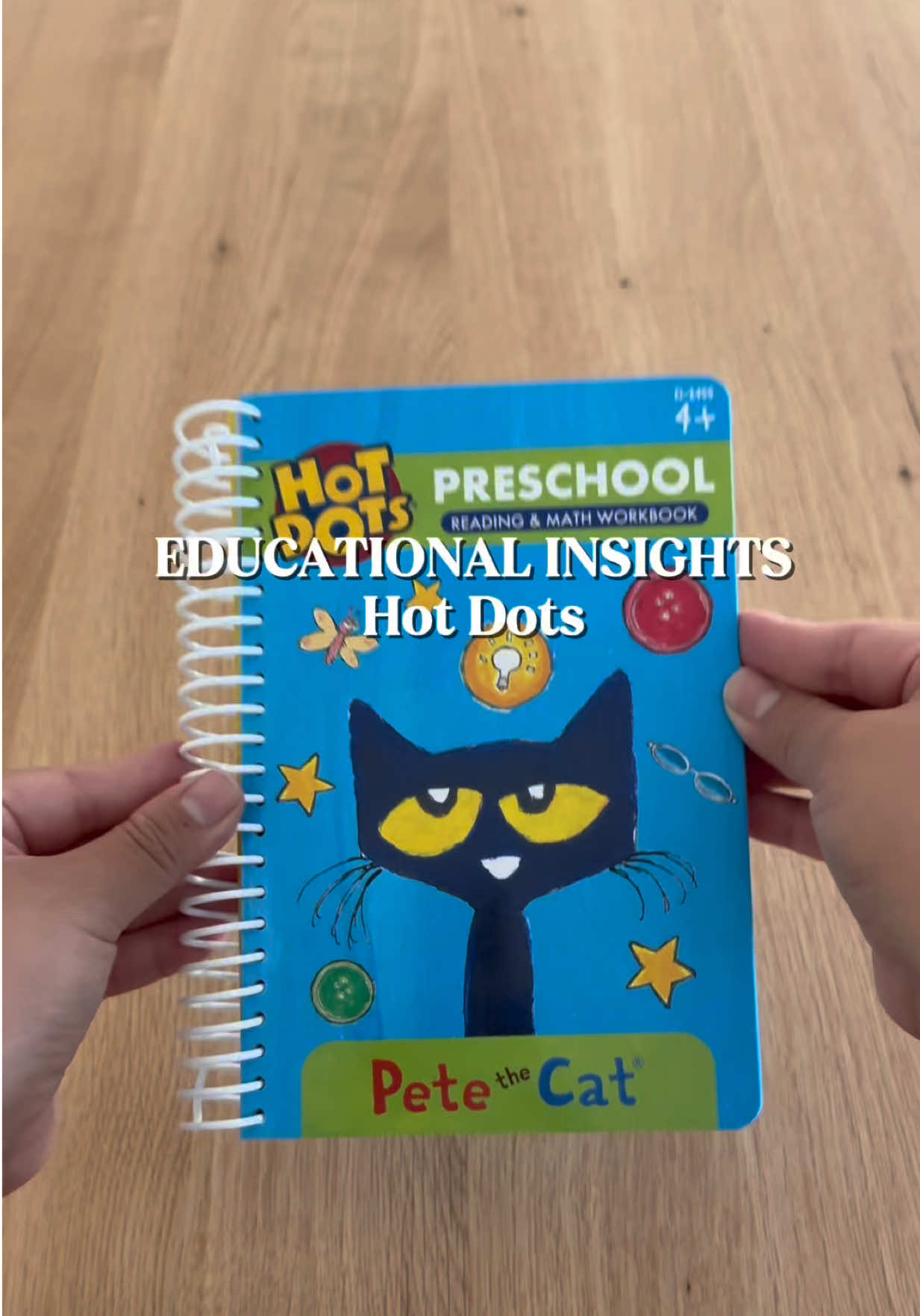 TikTok post by @playtimewithseb for Educational Insights. Caption reads: [...] reusable Hot Dots workbook by @Educational....