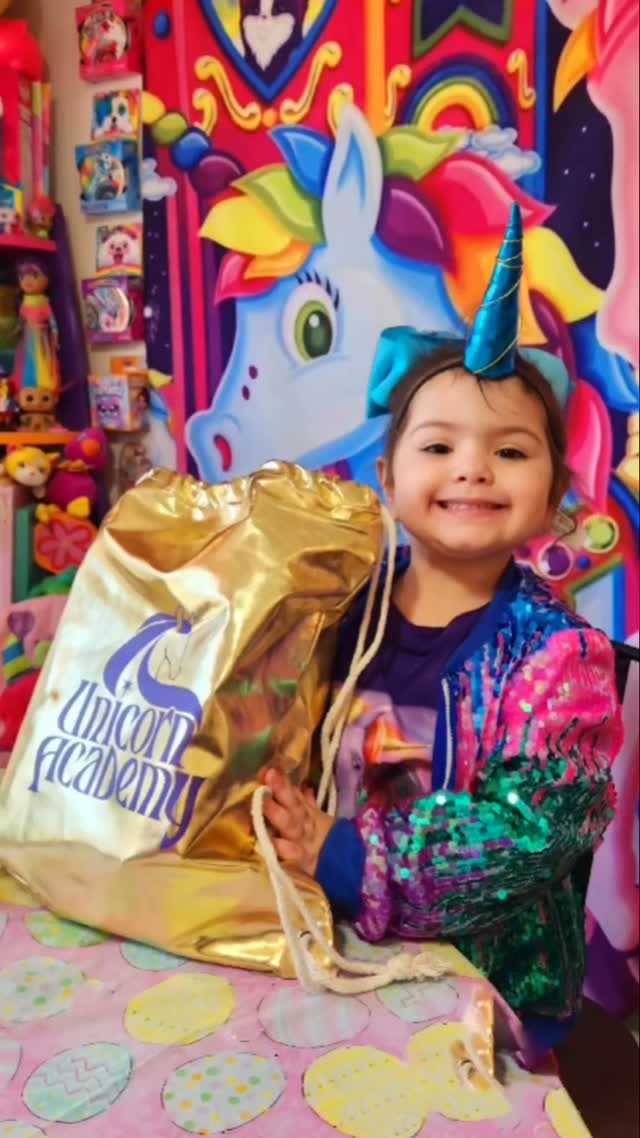 Instagram post by @therainbowfamilyfun for FAO Schwarz. Caption reads: 🦄 It's #UnicornDay and Netflix just dropped the....