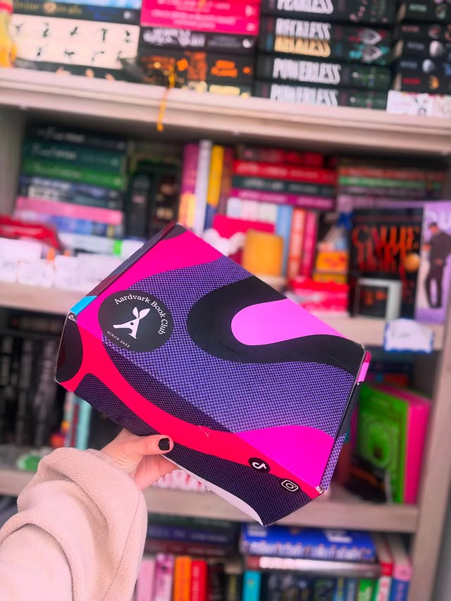 Instagram post by @ambersmagicallibrary for Aardvark Book Club. Caption reads: [...] on my doorstep 🥹✨ So grateful to....