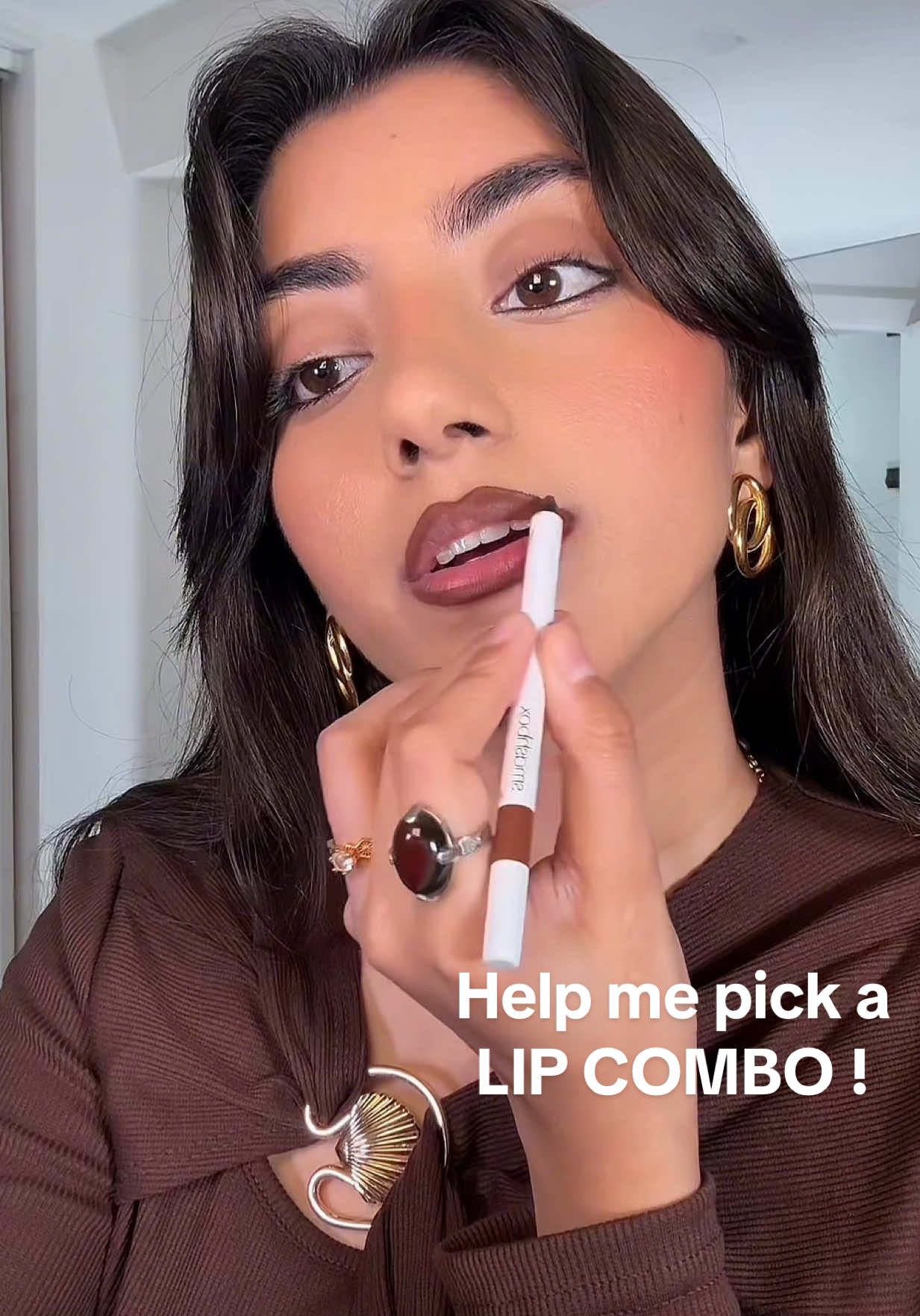 TikTok post by @lifewithsundas for Smashbox Venice. Caption reads: Help me pick a lip combo for date night... Luster....