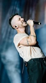 Instagram post by @junior_oficial for Rock in Rio. Caption reads: a vida é louca e mto massa. sensacional estar de....