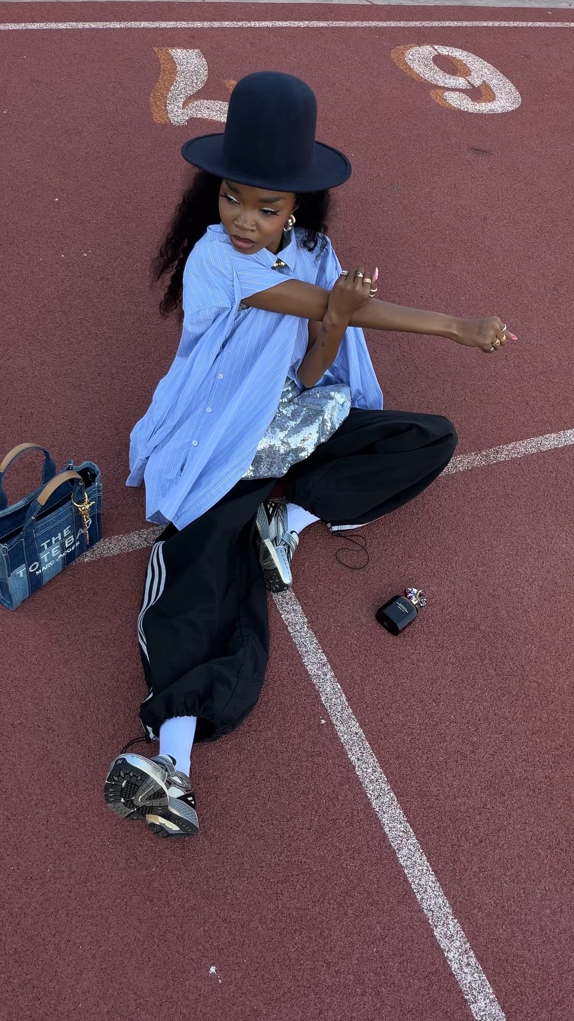 Instagram post by @yaone_refentse for Marc Jacobs Fragrances. Caption reads: [...] doing the absolute most with....