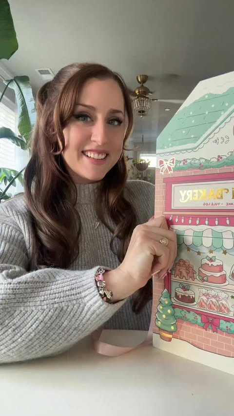 Instagram post by @rosymaplesloth for Sanrio. Caption reads: Open day 22 of my Sanrio advent calendar with me!....
