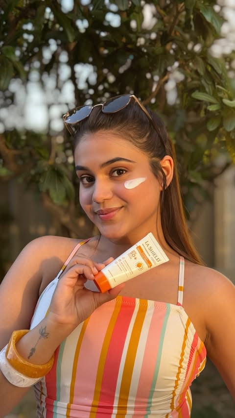 Instagram post by @ishika.farma for La Shield. Caption reads: [...] and not forgetting my sunscreen ☀️🏖️ La....