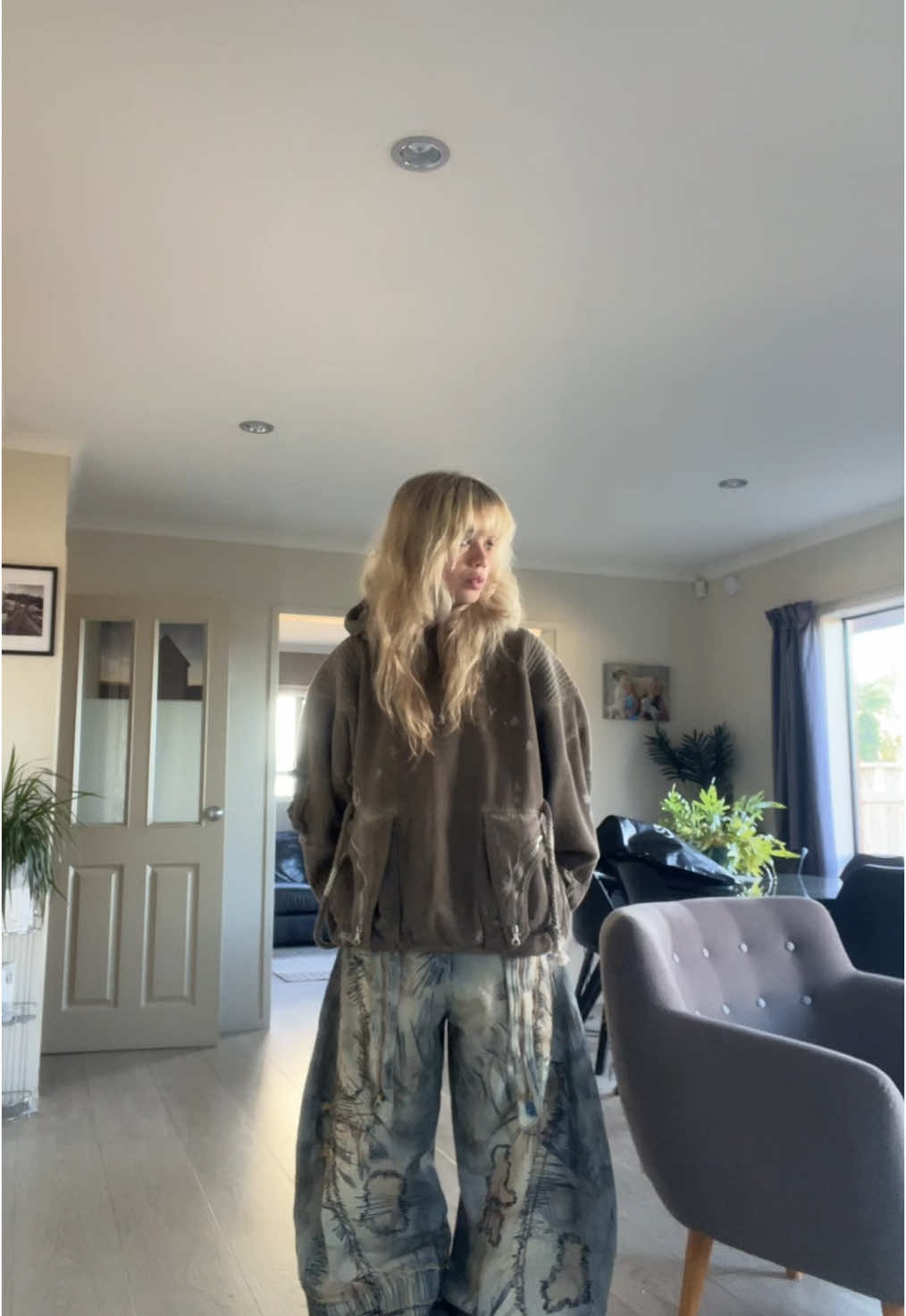 TikTok post by @iloveyougrogia for Personsoul. Caption reads: @PERSONSOUL with the coolest clothing pieces out....