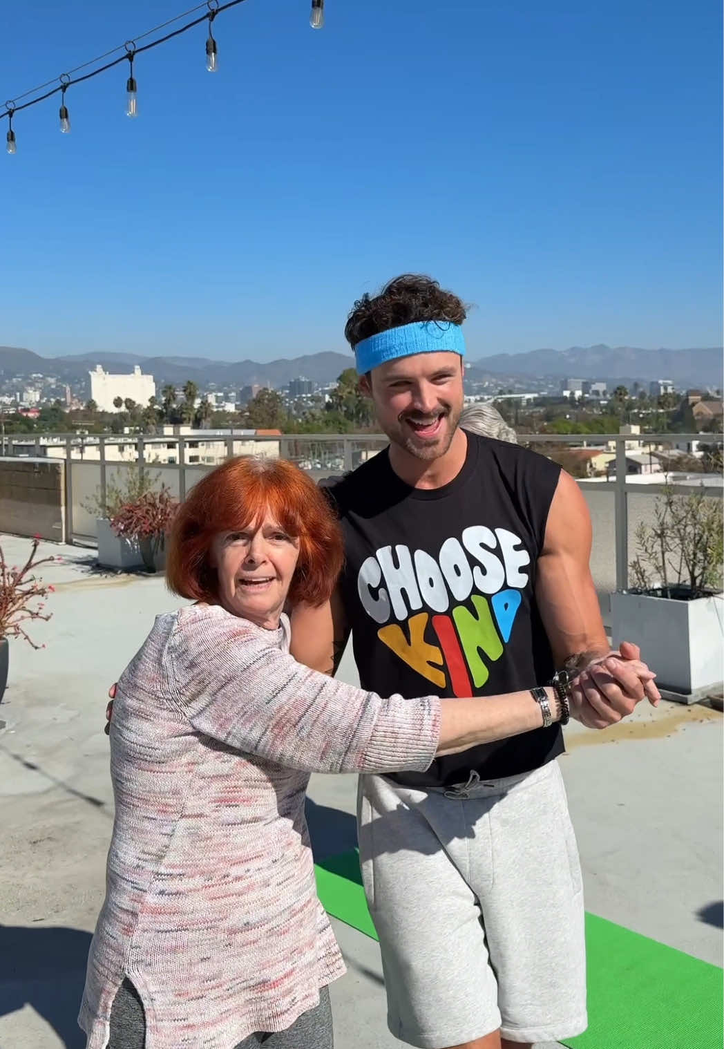 TikTok post by @dylanefron for KIND Snacks. Caption reads: Sometimes kindness is just showing up 💛🤝 @KIND....