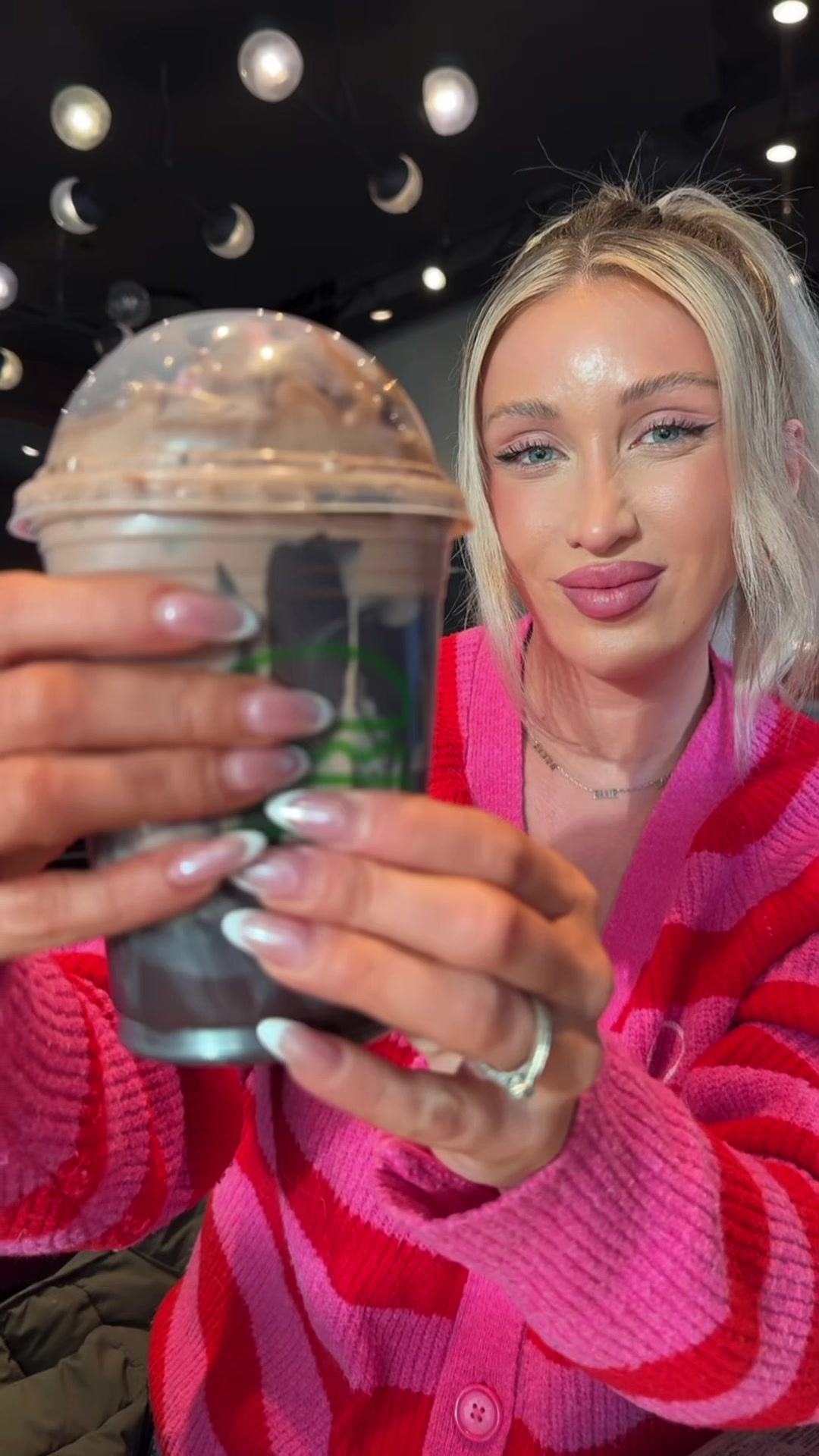 TikTok post by @nikkoleledda for Shake Shack. Caption reads: Not the day I expected but @shakeshack made it....