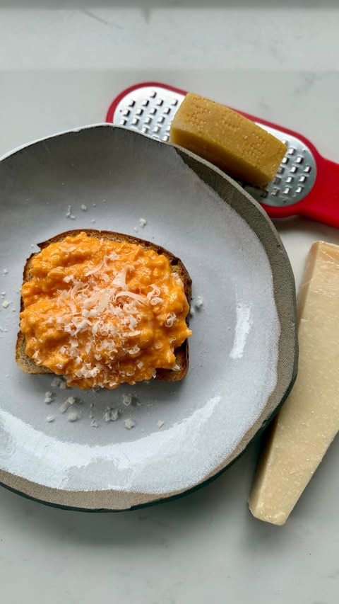 Instagram post by @_eating_with_emily for Parmigiano Reggiano. Caption reads: [...] always asking for extra Parmigiano Reggiano....