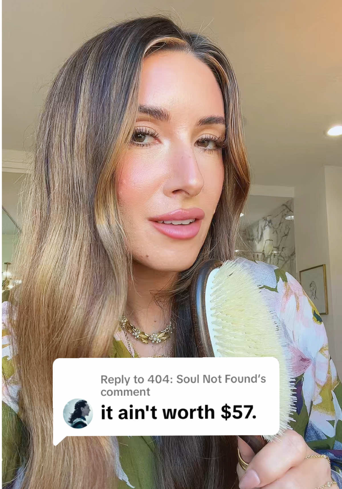 TikTok post by @sincerely.sarahandharry for Bur Bur. Caption reads: [...] Cent. 🤍 The essential hair brush from @BUR....