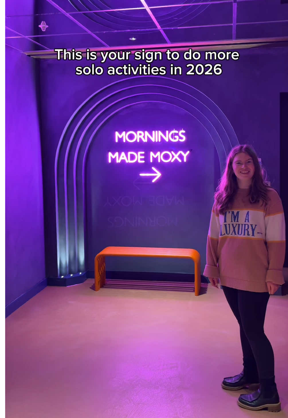 TikTok post by @sophiewhotravels for Moxy Hotels. Caption reads: Make 2025 and 2026 the era where you stop waiting....