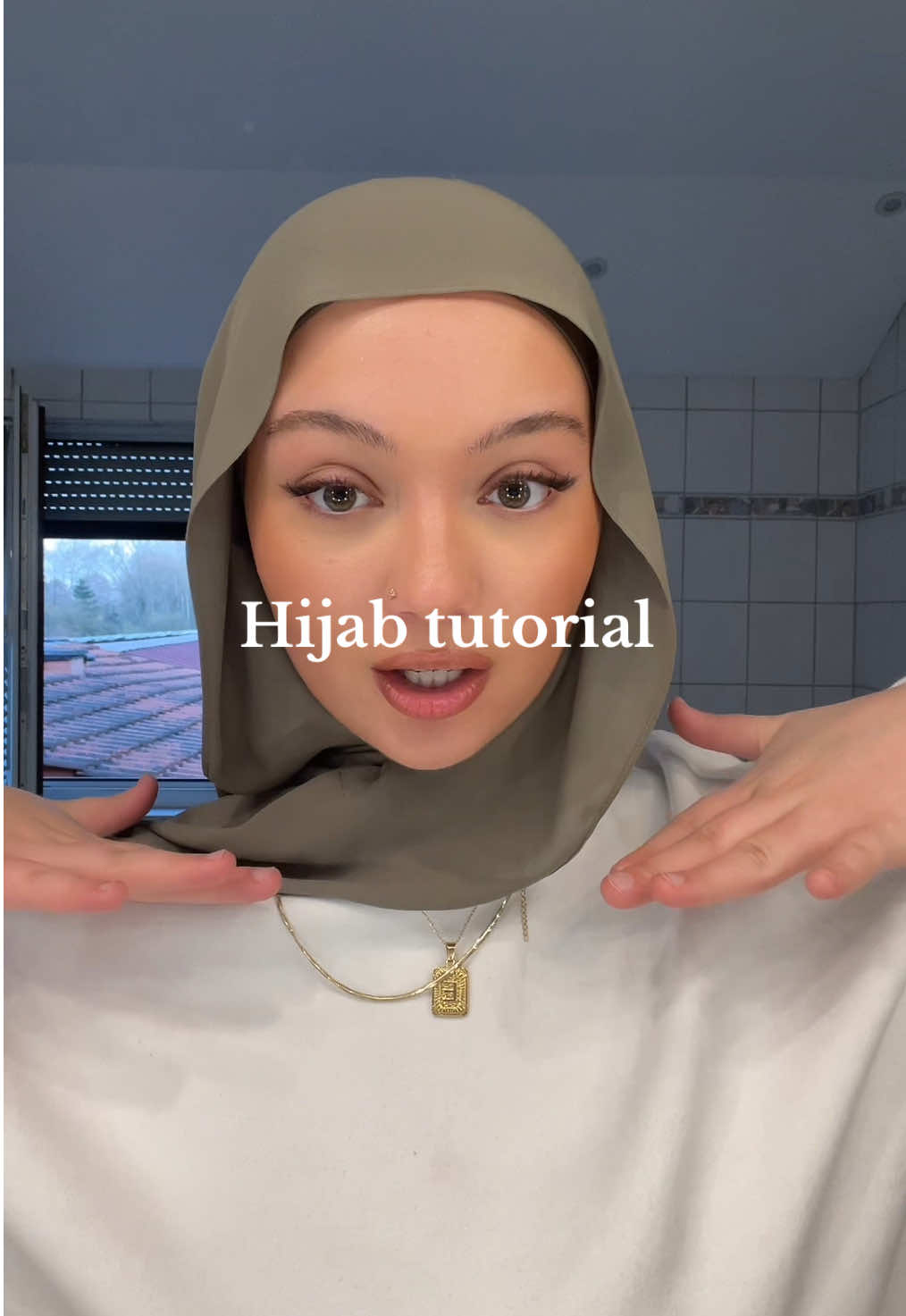 TikTok post by @eyaadore for NYVA. Caption reads: ad 1 Hijab 5 Looks  from @NYVA ! ✨🌴#hijabtutorial....