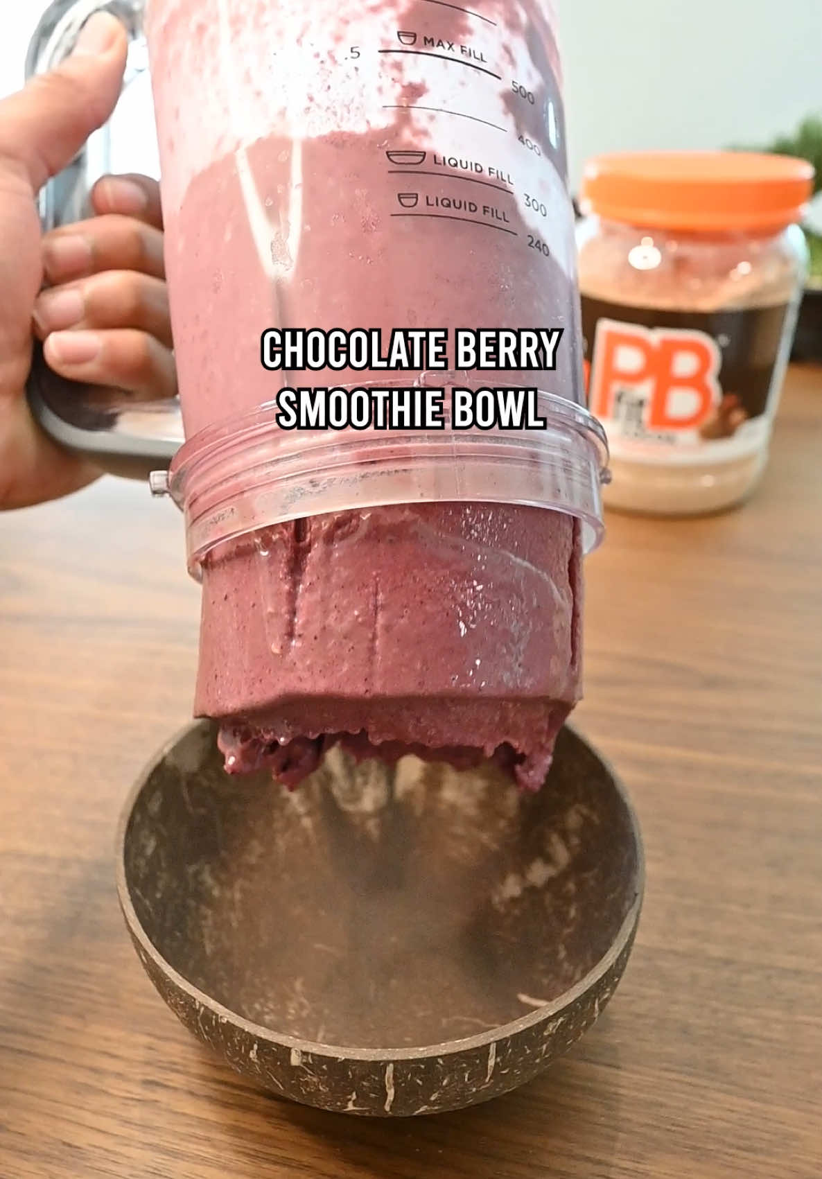TikTok post by @smoothieflip for PBfit. Caption reads: sensational smoothie crafted w/ @PBfit cocoa!! 🥜....