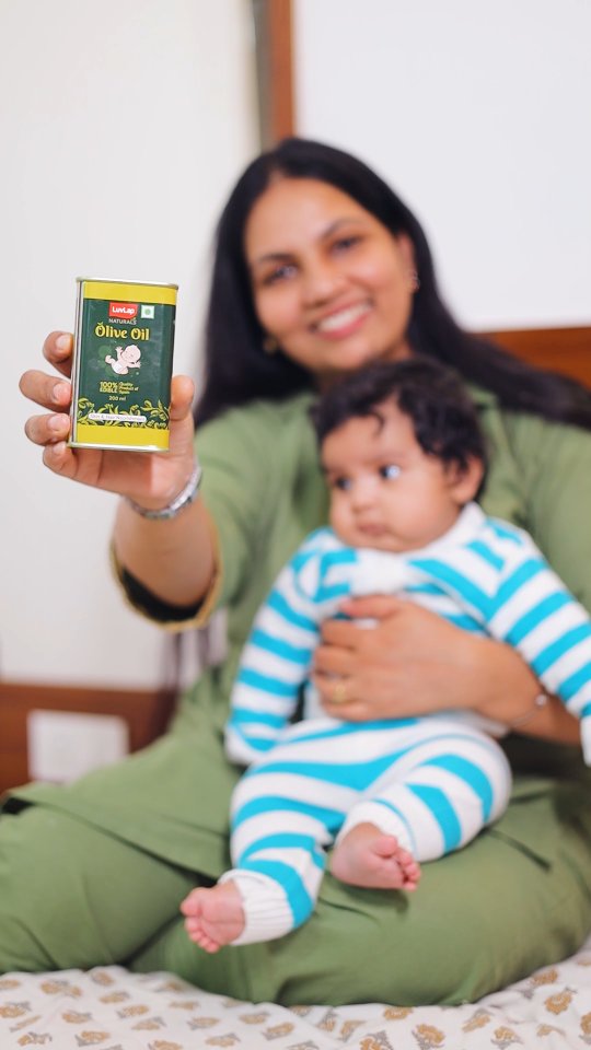 Instagram post by @sainishrishti for LuvLap. Caption reads: Give your baby the nourishment of pure olive....