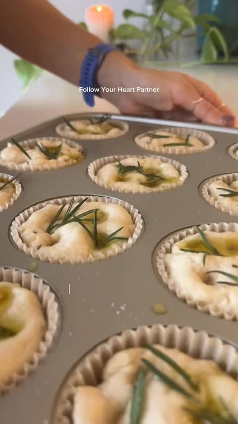 Instagram post by @minaelleskitchen.ca for Follow Your Heart. Caption reads: #ad No-knead rosemary & sea salt focaccia rolls....