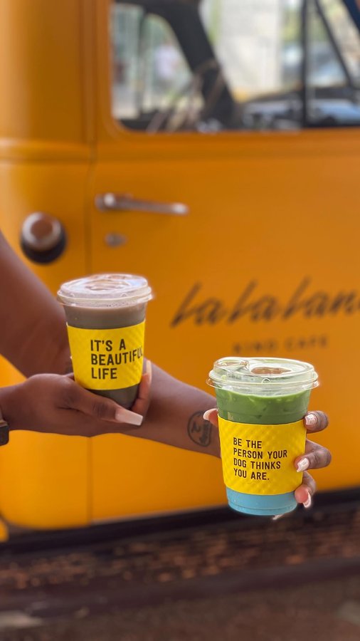 Instagram post by @notthattianataylor for La La Land Kind Cafe. Caption reads: 🚨NEW COFFEE SHOP🚨 📍 @lalalandkindcafe Houston....