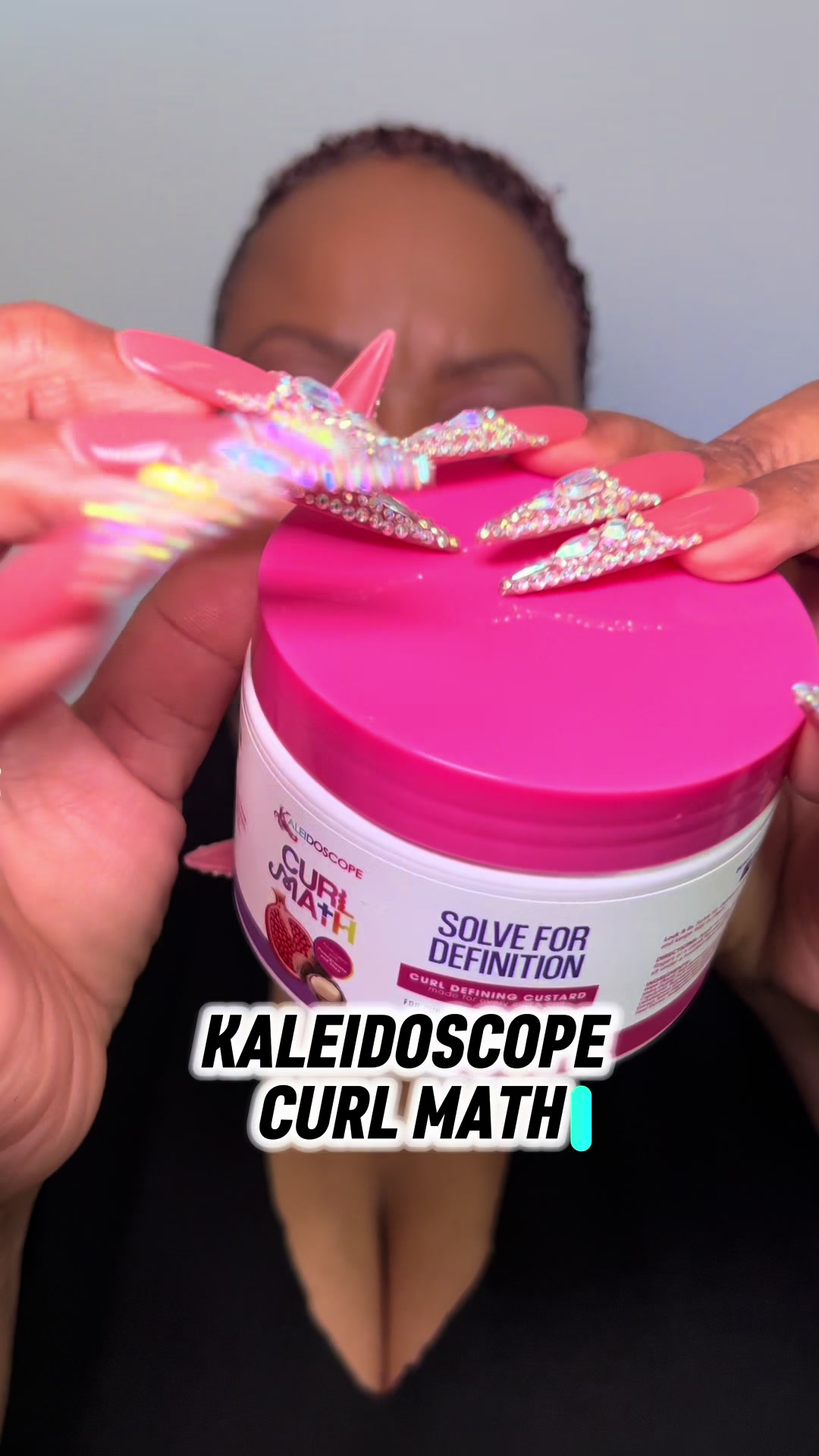TikTok post by @asmr.nikki.nibblez for Kaleidoscope Hair Products. Caption reads: ASMR| KALEIDOSCOPE CURL MATH|....