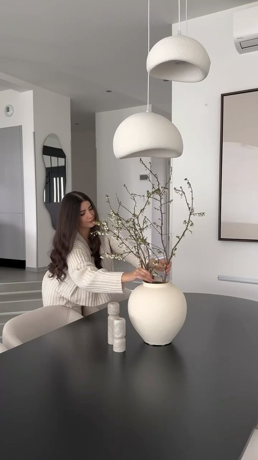 Instagram post by @interior.ela for Westwing. Caption reads: Decoration is a way to bring softness into....