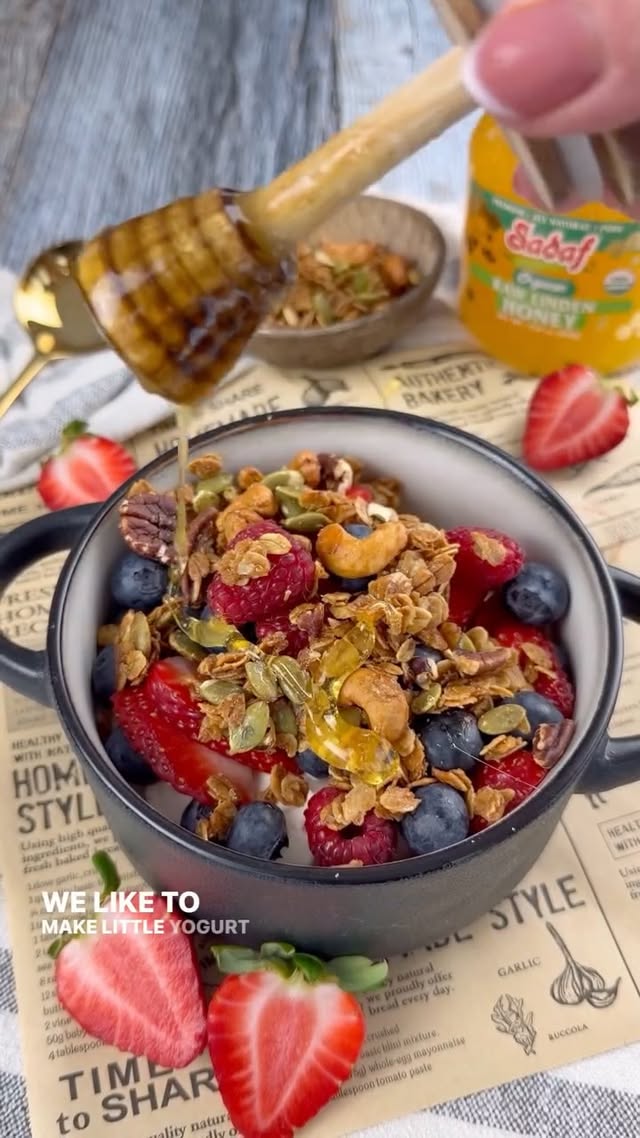 Instagram post by an influencer for Sadaf Foods. Caption reads: Golden Crunchy Granola- I always have a jar of it....