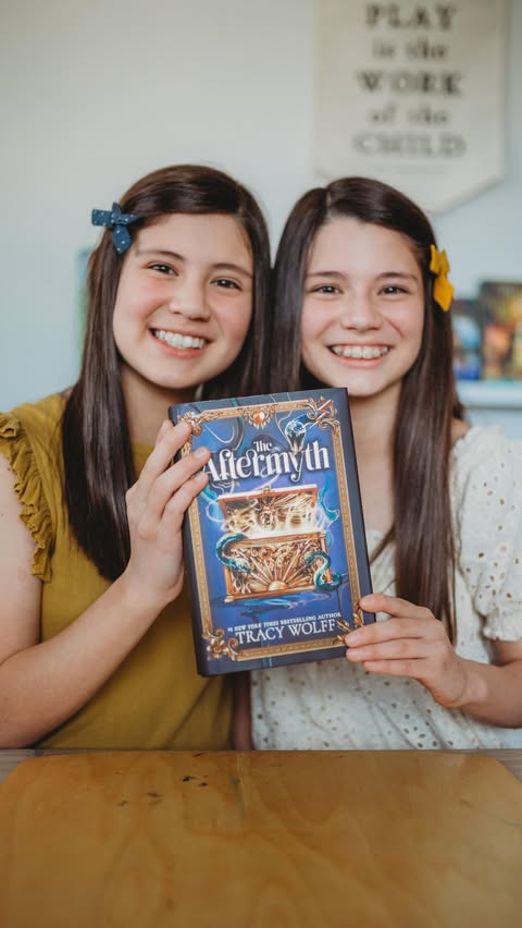 Instagram post by @homeschoolingmoonchildren for Simon & Schuster. Caption reads: Calling all @tracywolffbooks fans: “The Aftermyth”....