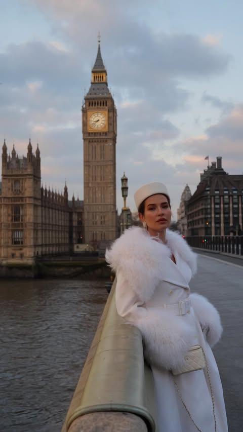 Instagram post by @styleandmakaroni for Karen Millen. Caption reads: Coat of my dreams 🦢@karen_millen.