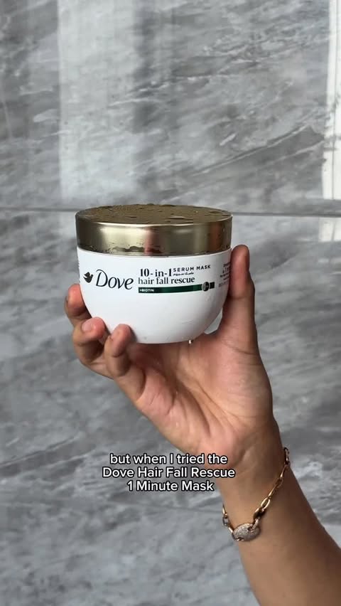 Instagram post by @mom_in_dubai for Dove. Caption reads: I swear by the Dove Hair Fall Rescue 1-minute mask....
