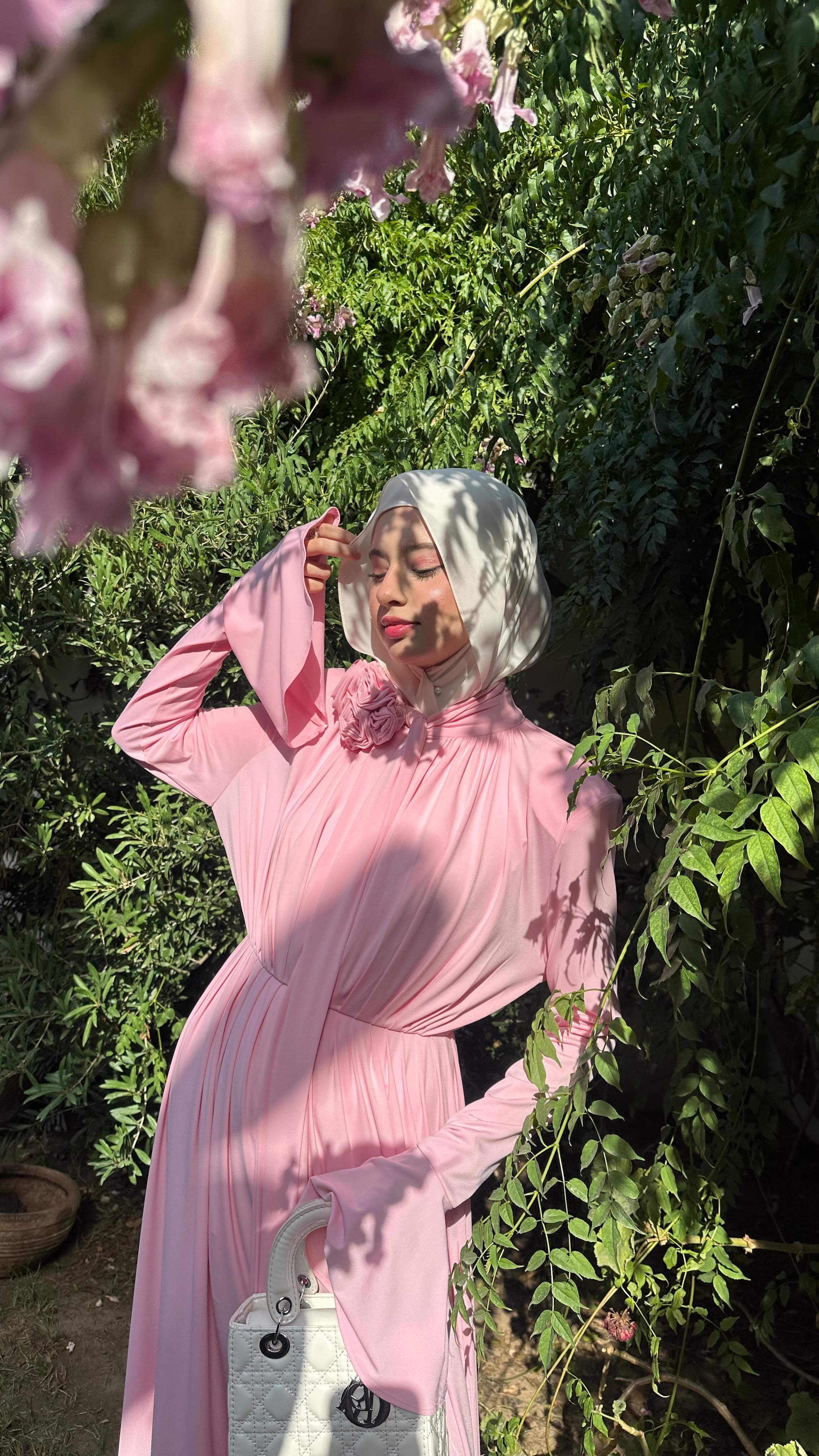 Instagram post by @leena_karwi for JardinVue. Caption reads: Blooming with this dress from @jardinvue 🌸🤍
Get....