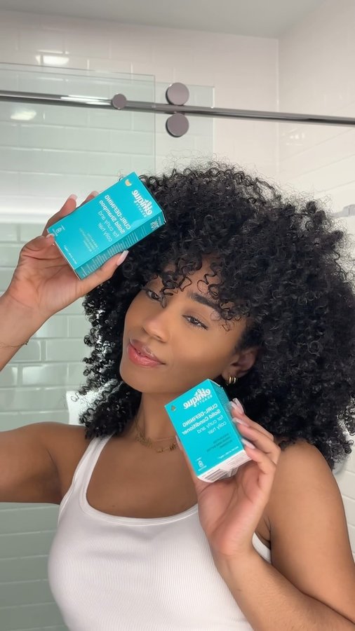 Instagram post by @thelaurynicole for Ethique. Caption reads: Curly Hair Vlog: Wash Day feat @ethiqueworld - in....