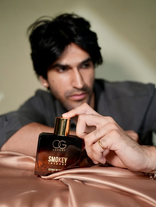 Instagram post by @kunalkapoor11_ for OG Beauty. Caption reads: Swipe to discover why **OG Luxury Smokey Intense**....