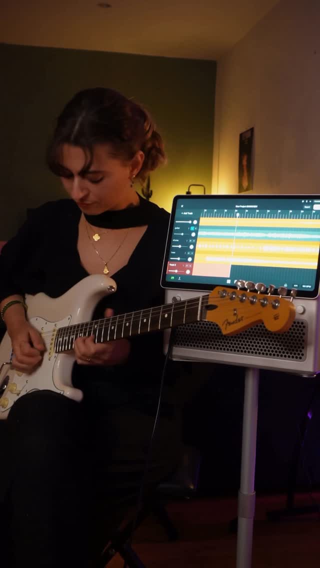 Instagram post by @songsofmeli for LAVA MUSIC. Caption reads: 🎸record your best guitar solos directly through....