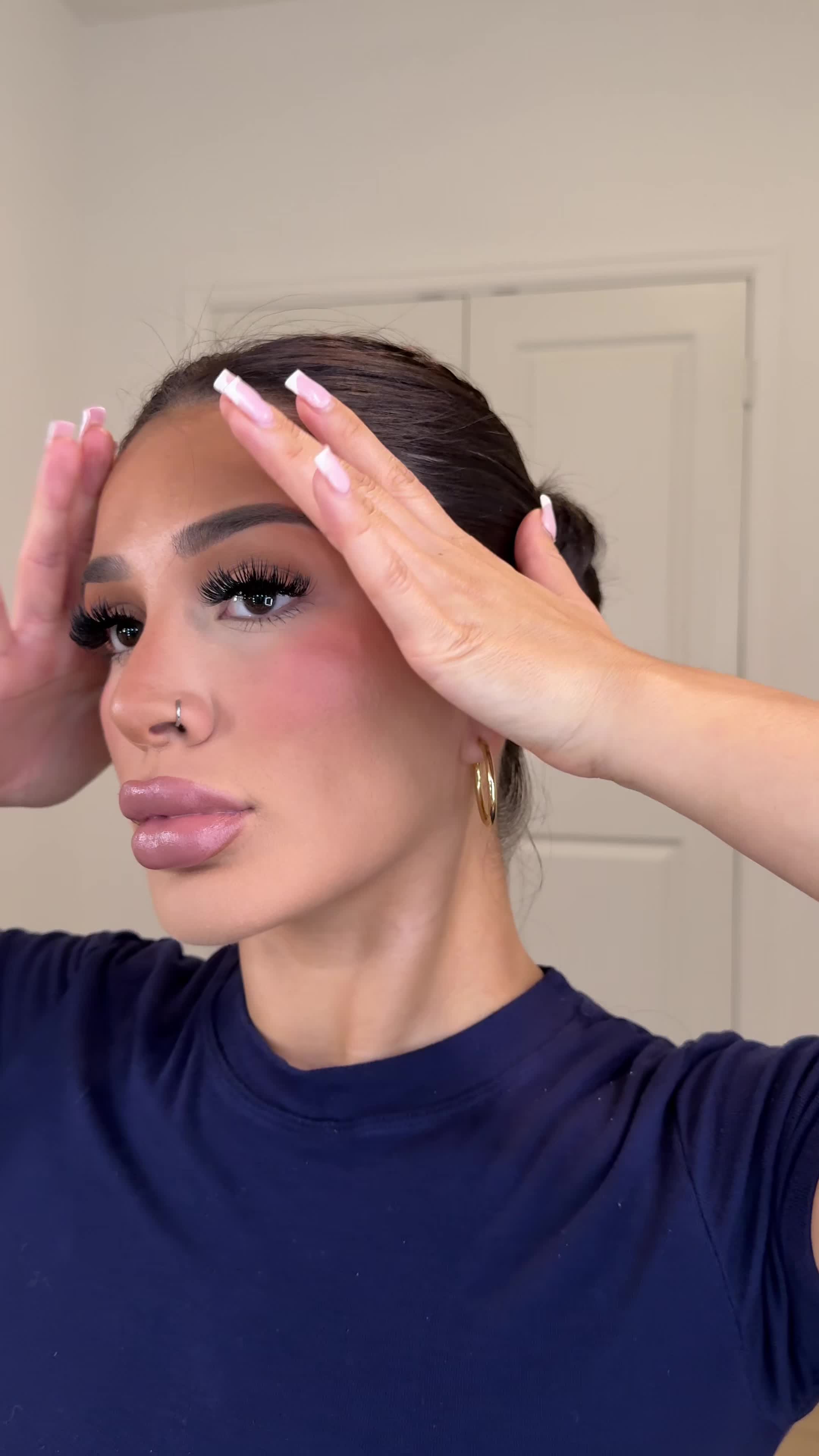 TikTok post by @prettylittlelex for Hourglass Cosmetics. Caption reads: Grwm using  FOUNDATION @L’Oréal Paris N3 mixed....