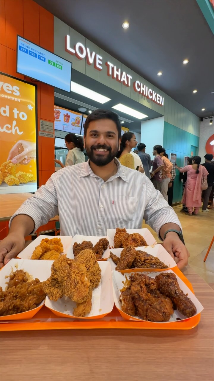 Instagram post by @delicious_kerala for Popeyes. Caption reads: Thrissur! There’s another hotspot in town— ....