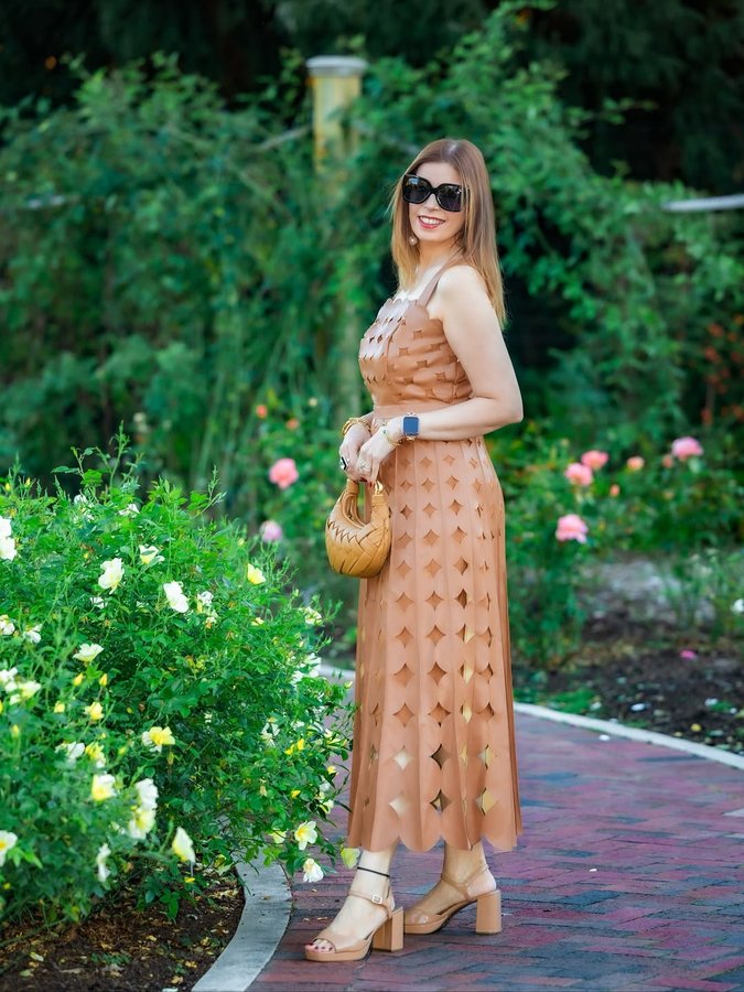 Instagram post by @official.vineeta_fashion for JW PEI. Caption reads: Catching fall feels in every shade of brown....