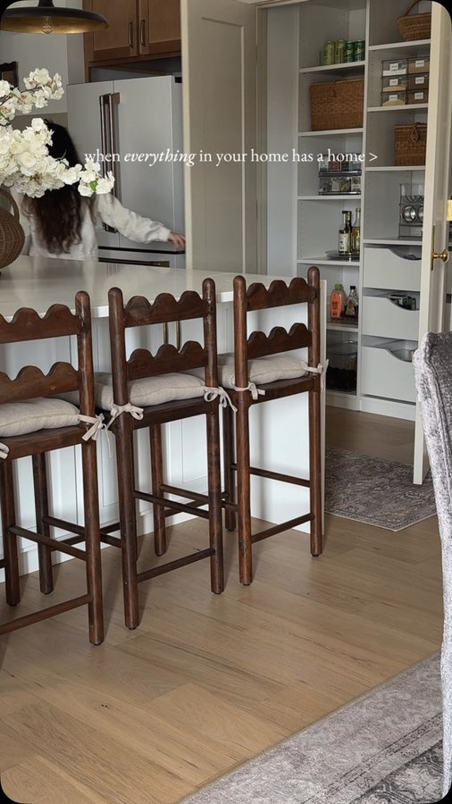 Instagram post by @thegeorgeshome for The Container Store. Caption reads: Gave my pantry a little refresh, and I love how it....