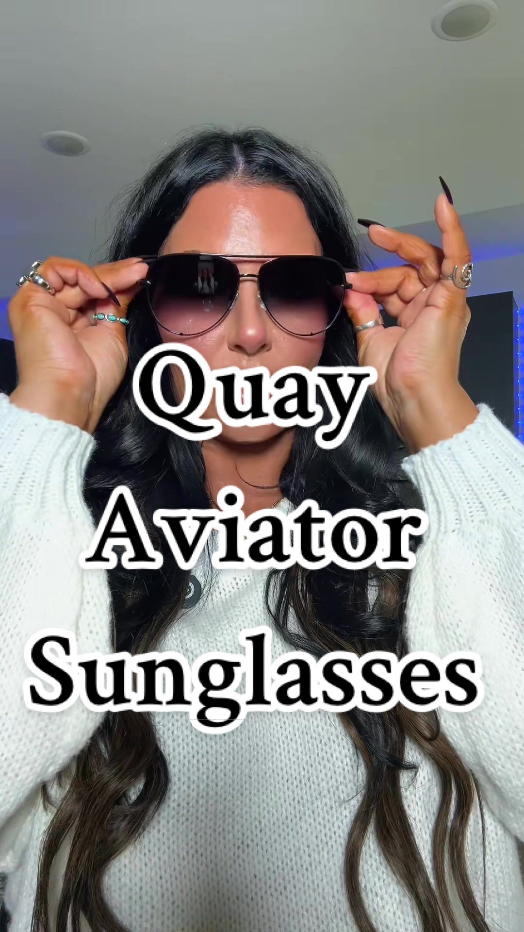 TikTok post by @ambergoobs for QUAY. Caption reads: I’m wearing black/fade 🖤😎 @Quay #quaysunglasses....