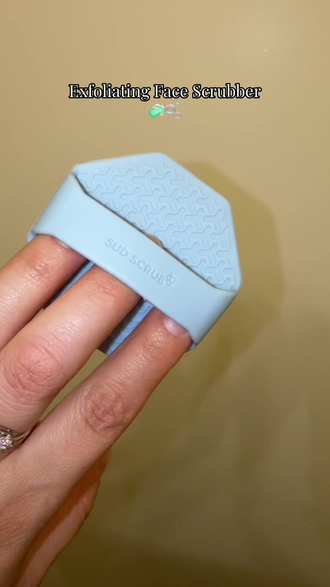 TikTok post by @soybritta_ for Sud Scrub. Caption reads: @Sud Scrub® #sudscrub #facescrubber #exfoliator....