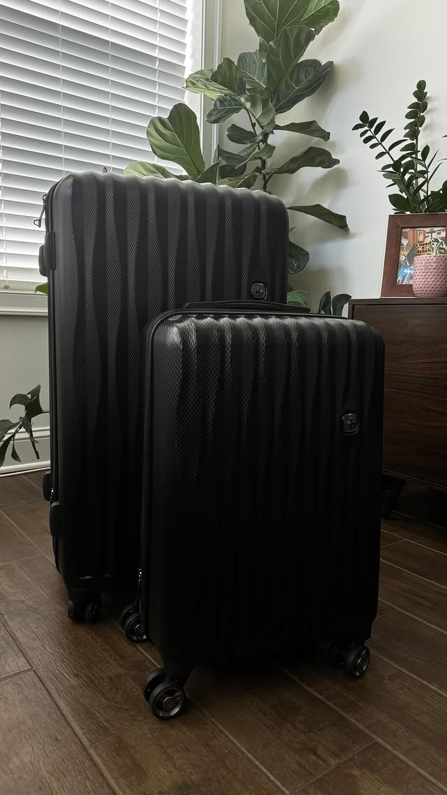 Instagram post by @bykatviana for SWISSGEAR. Caption reads: [...] near ready 🥴 send help #Sponsored....