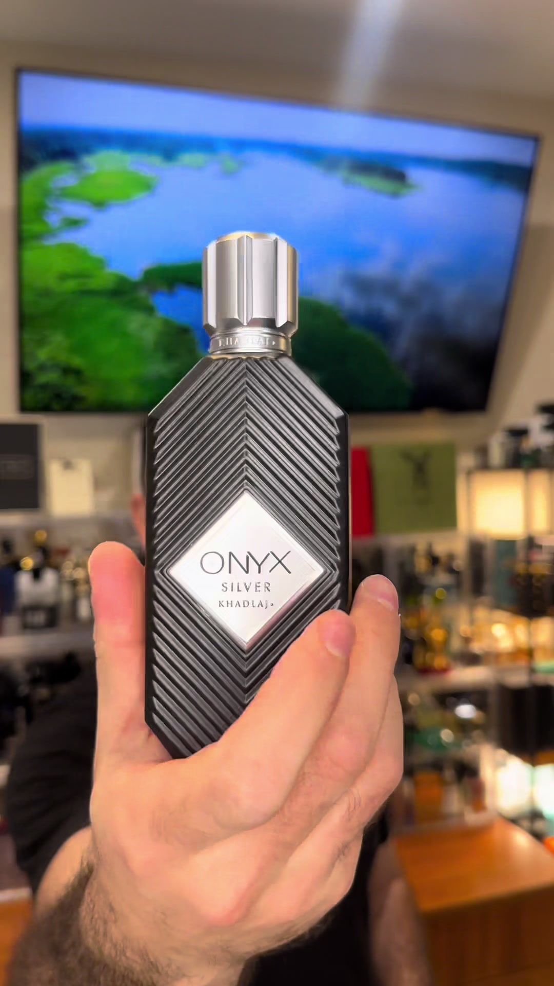 TikTok post by @fahoodyfragrance for Beauty House. Caption reads: [...] Silver fragrance review. Thank you....