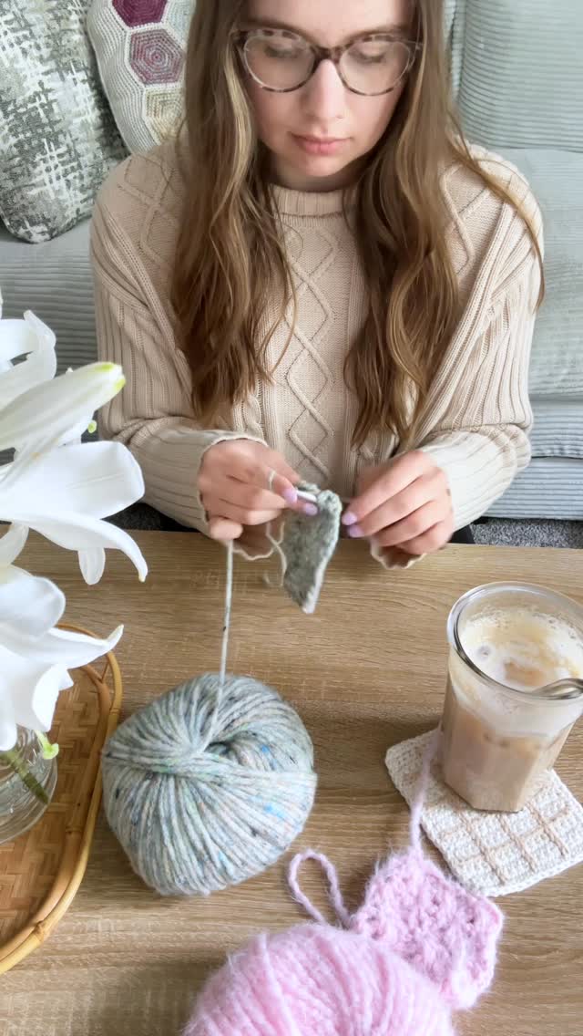 Instagram post by @stitchberryblog for Universal Yarn. Caption reads: which swatch do you like better?!☁️✨ I’m torn....