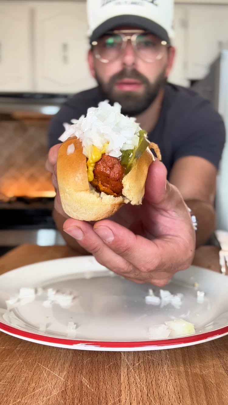 Instagram post by @danseidman for Beyond Meat. Caption reads: CHEESE DOGS 🌭 🍔 @beyondmeat sausages wrapped in....
