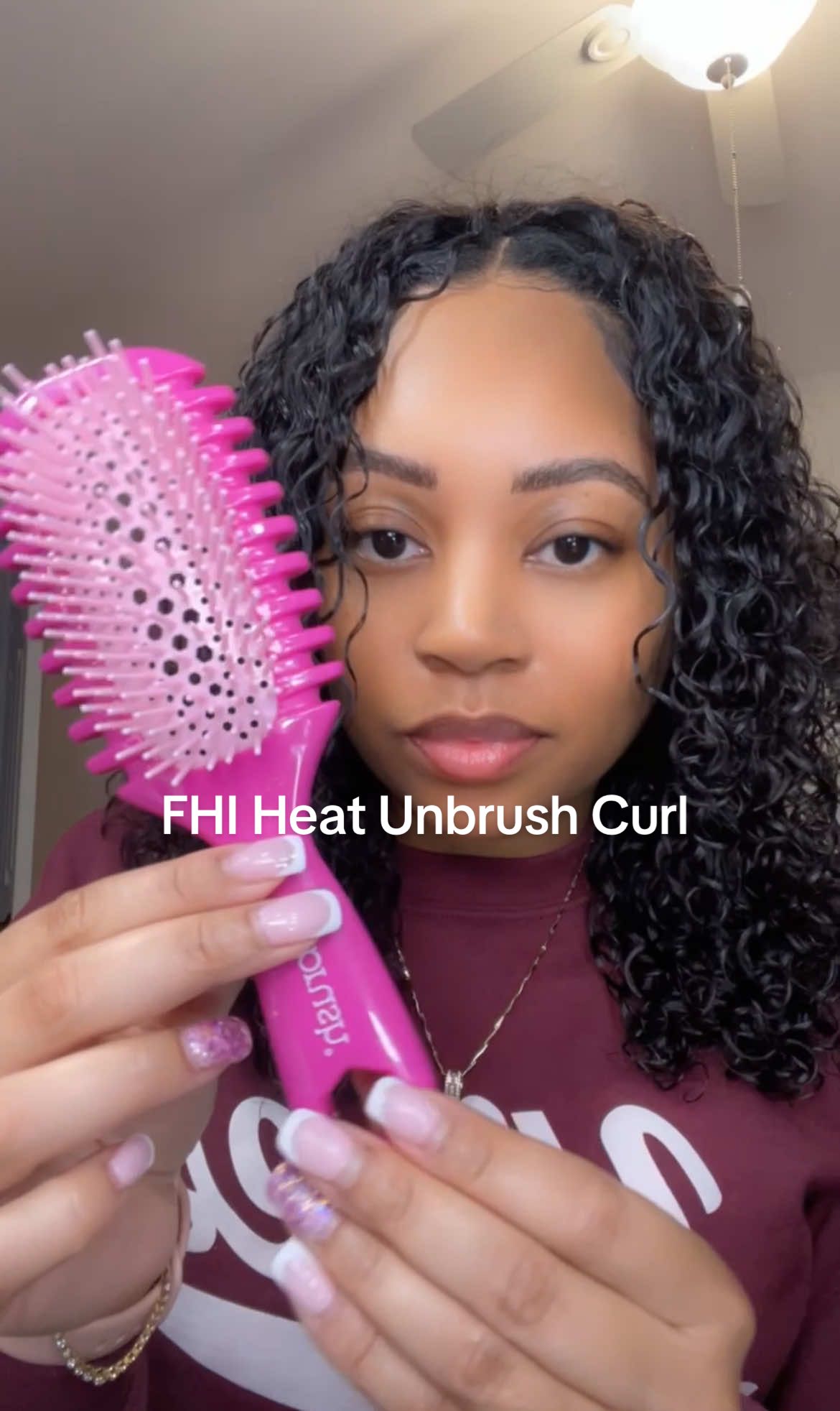 TikTok post by @lovely_lavishh for FHI Heat. Caption reads: Meet the new @FHI HEAT Unbrush Curl✨✨ 😍😍😍😍....