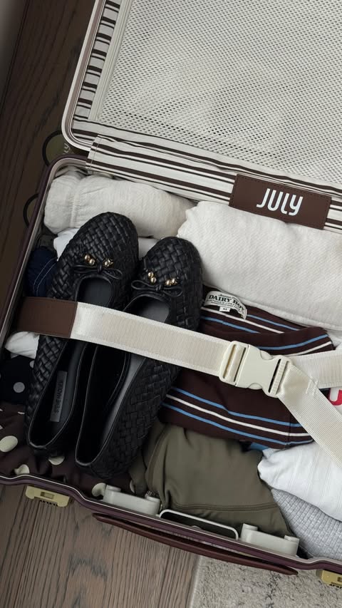 Instagram post by @endilarad for July. Caption reads: [...] made being on the move so much easier @july.